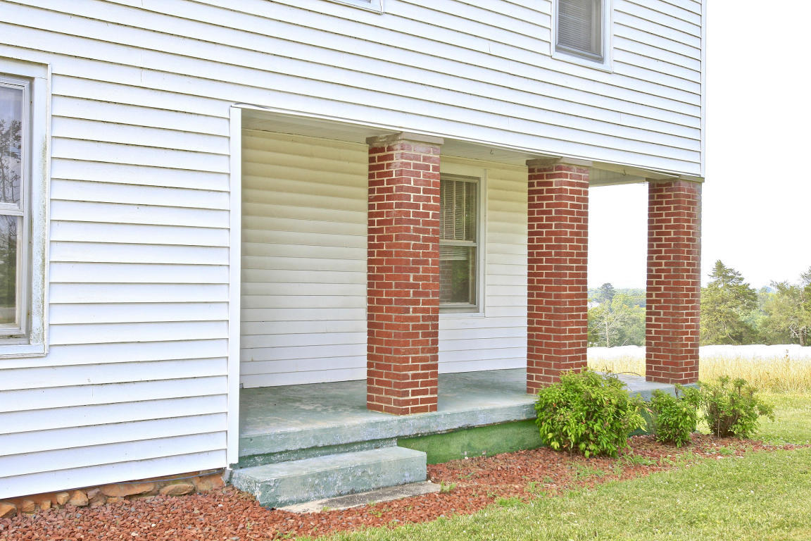 390 Kemp Ford Road Union Hall, VA 24176 - Photo 42 of 47 a view of a house with a yard and plants
