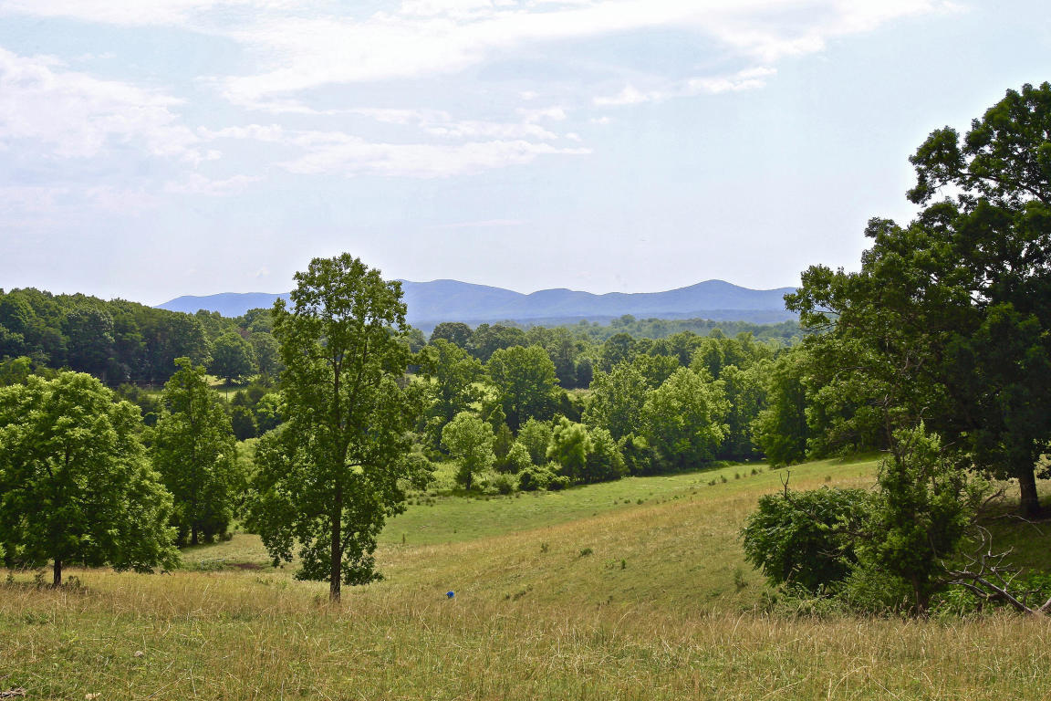 390 Kemp Ford Road Union Hall, VA 24176 - Photo 43 of 47 a view of a lake with a mountain in the background