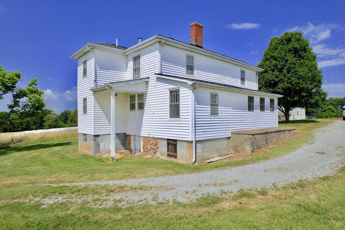390 Kemp Ford Road Union Hall, VA 24176 - Photo 46 of 47 a front view of a house with garden