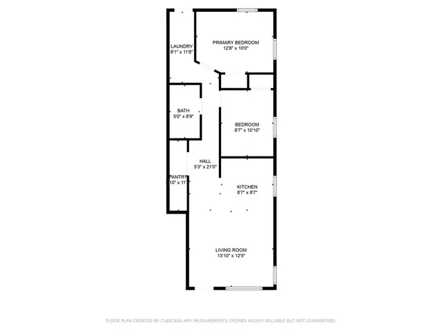 a picture of a bench in front of a wall