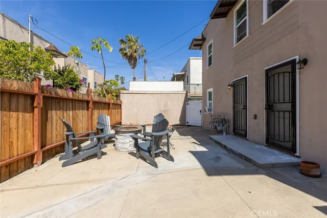 a view of a swimming pool with chairs