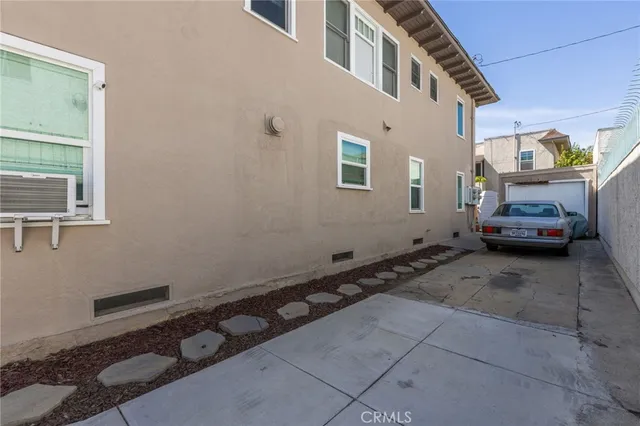 a view of a car in front of a house