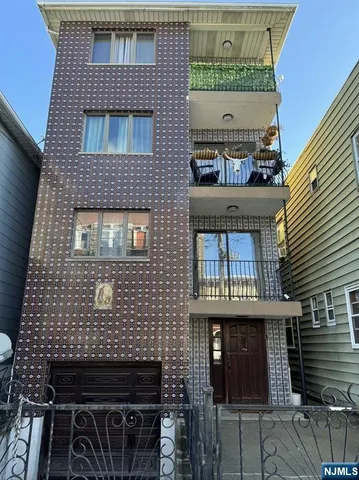 a front view of a house with a door