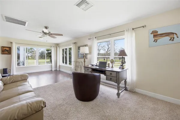 a spacious bathroom with a double vanity sink and a mirror