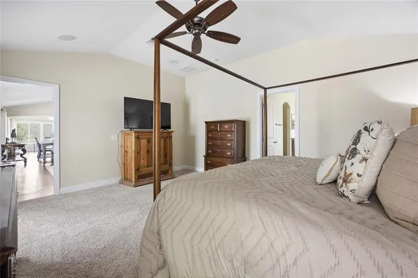 a view of a chairs and table in the balcony