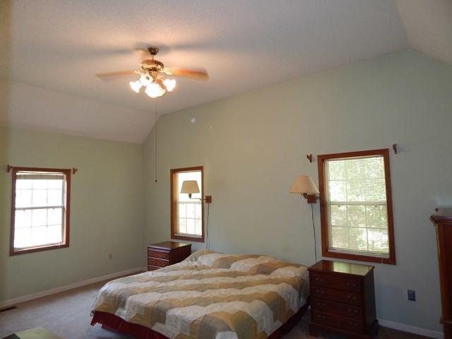 826 McKay Road Gray, GA 31032 - Photo 12 of 28 a bedroom with a bed and a window