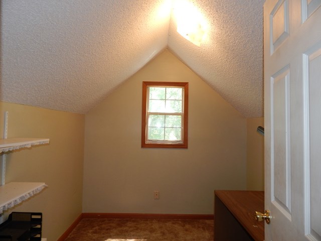 826 McKay Road Gray, GA 31032 - Photo 23 of 28 an empty room with windows