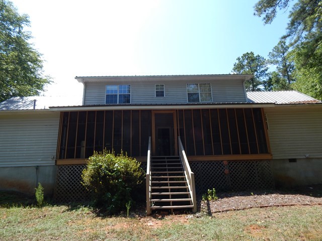 826 McKay Road Gray, GA 31032 - Photo 25 of 28 a view of a house with a yard