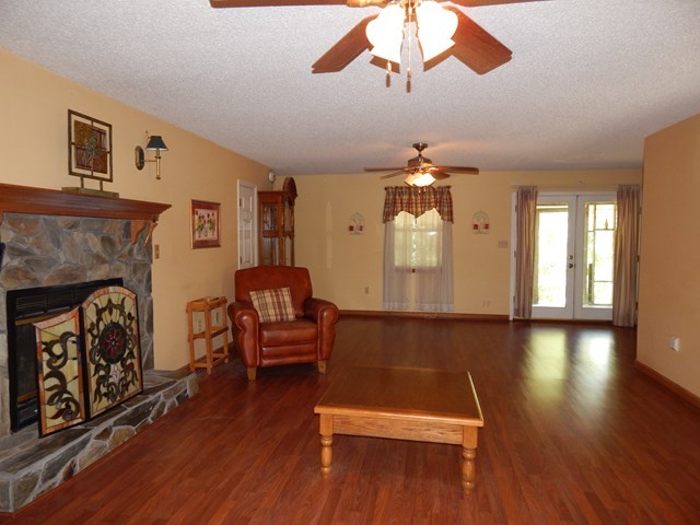 826 McKay Road Gray, GA 31032 - Photo 6 of 28 a living room with furniture and a fireplace