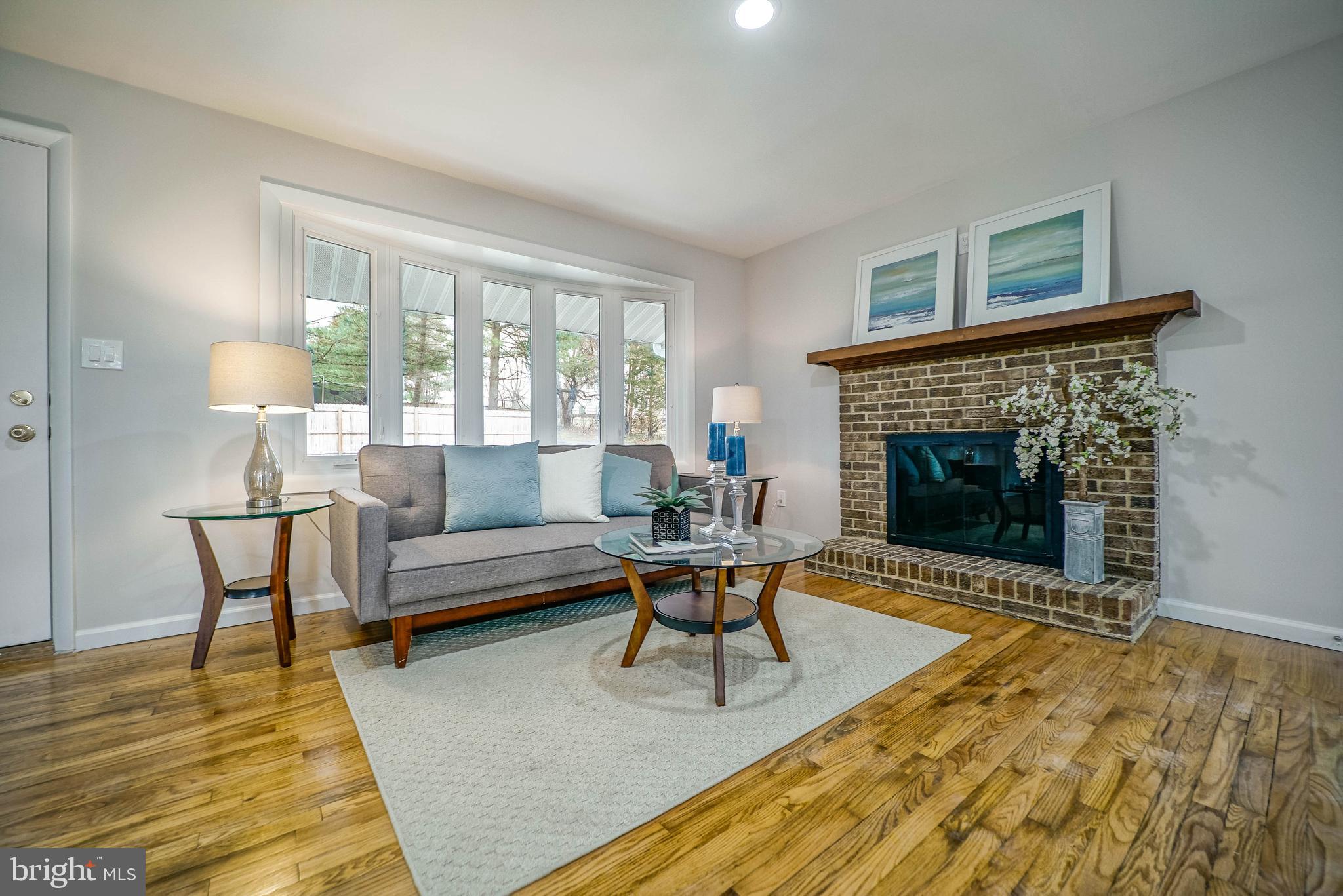2129 Flag Marsh Road Mount Airy, MD 21771 - Photo 5 of 26 Living Room with Bay Window & Fireplace