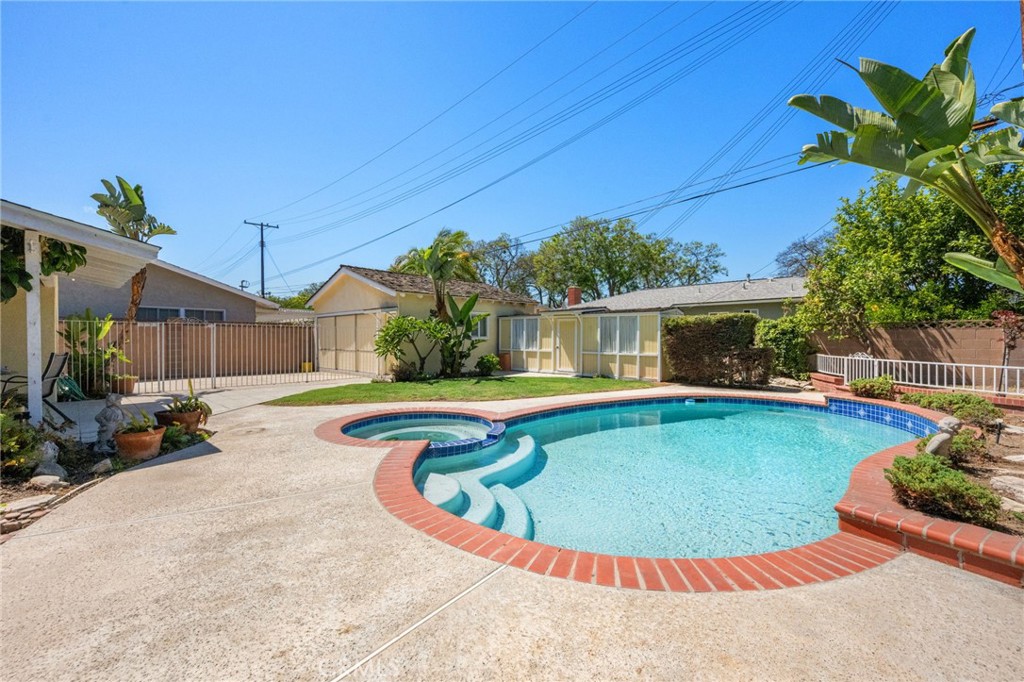 939 West Orange Road Santa Ana, CA 92706 - Photo 1 of 1 Great back yard with nice pool & spa, playhouse and detached 2 car garage.