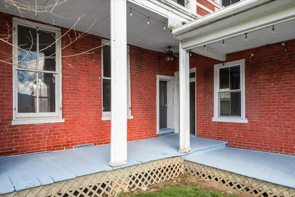 an aerial view of residential building and parking space