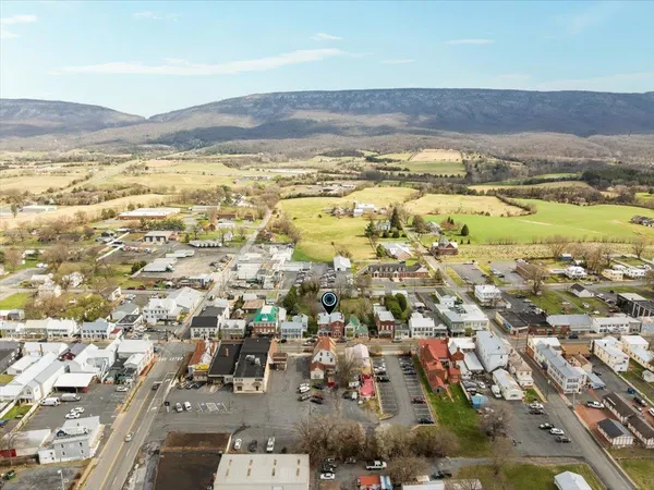 a view of an empty room and with a white wall