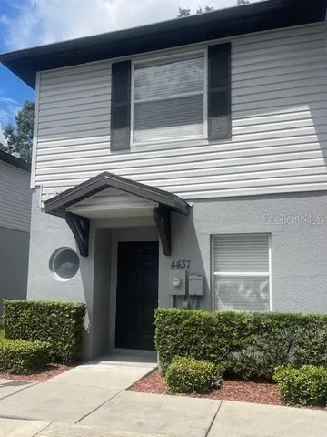 a front view of a house with a garage