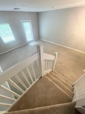 a view of an empty room and window