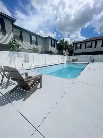 a view of a terrace with chairs