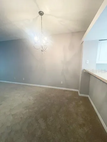 a view of a room with an empty space