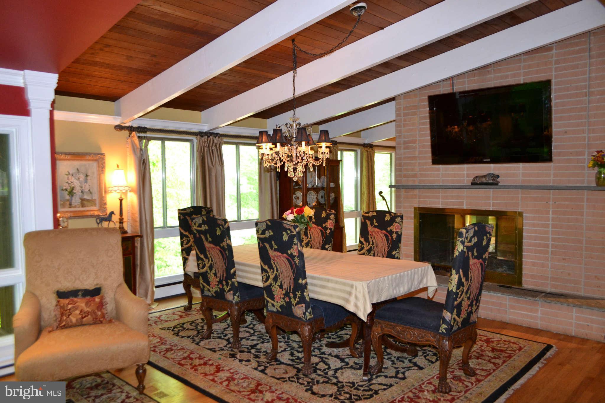 2008 Ridgecrest Court Ruxton, MD 21204 - Photo 16 of 30 Dining Room with double sided fireplace