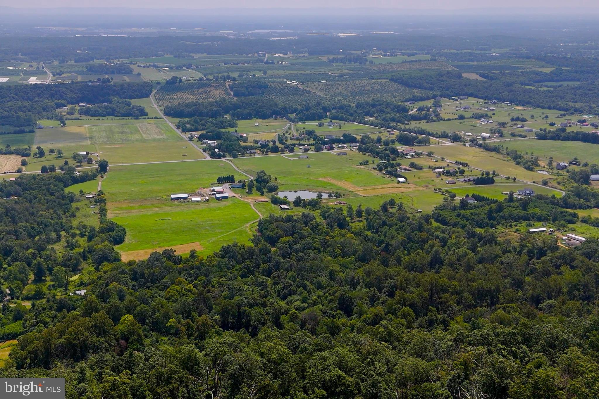 Lot 12 Radio Tower Road Gerrardstown, WV 25420 - Photo 10 of 22 an aerial view of a houses with a lake view