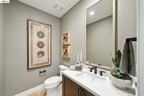 a bathroom with a double vanity sink bathtub and double