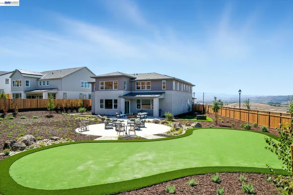 a view of a house with a big yard