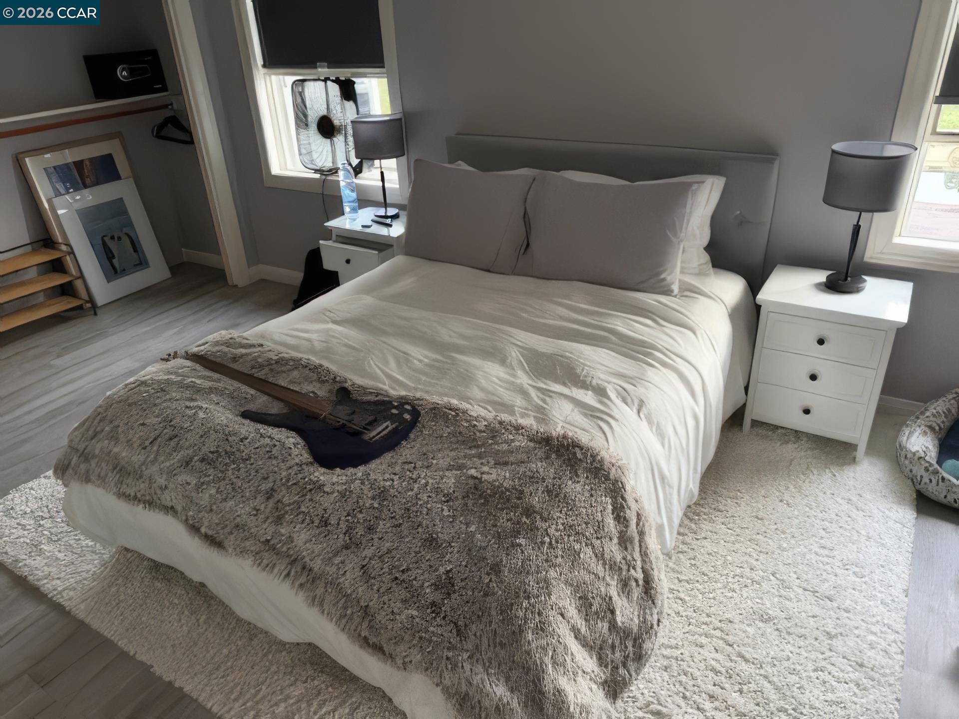 10580 Dickson Road Plymouth, CA 95669 - Photo 22 of 64 a bedroom with a bed and a mirror