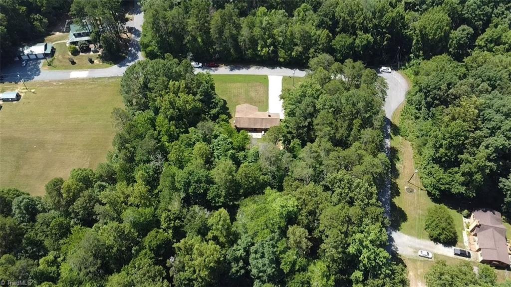 1015 Meadowview Road Walnut Cove, NC 27052 - Photo 23 of 27 Woods surround yard and house