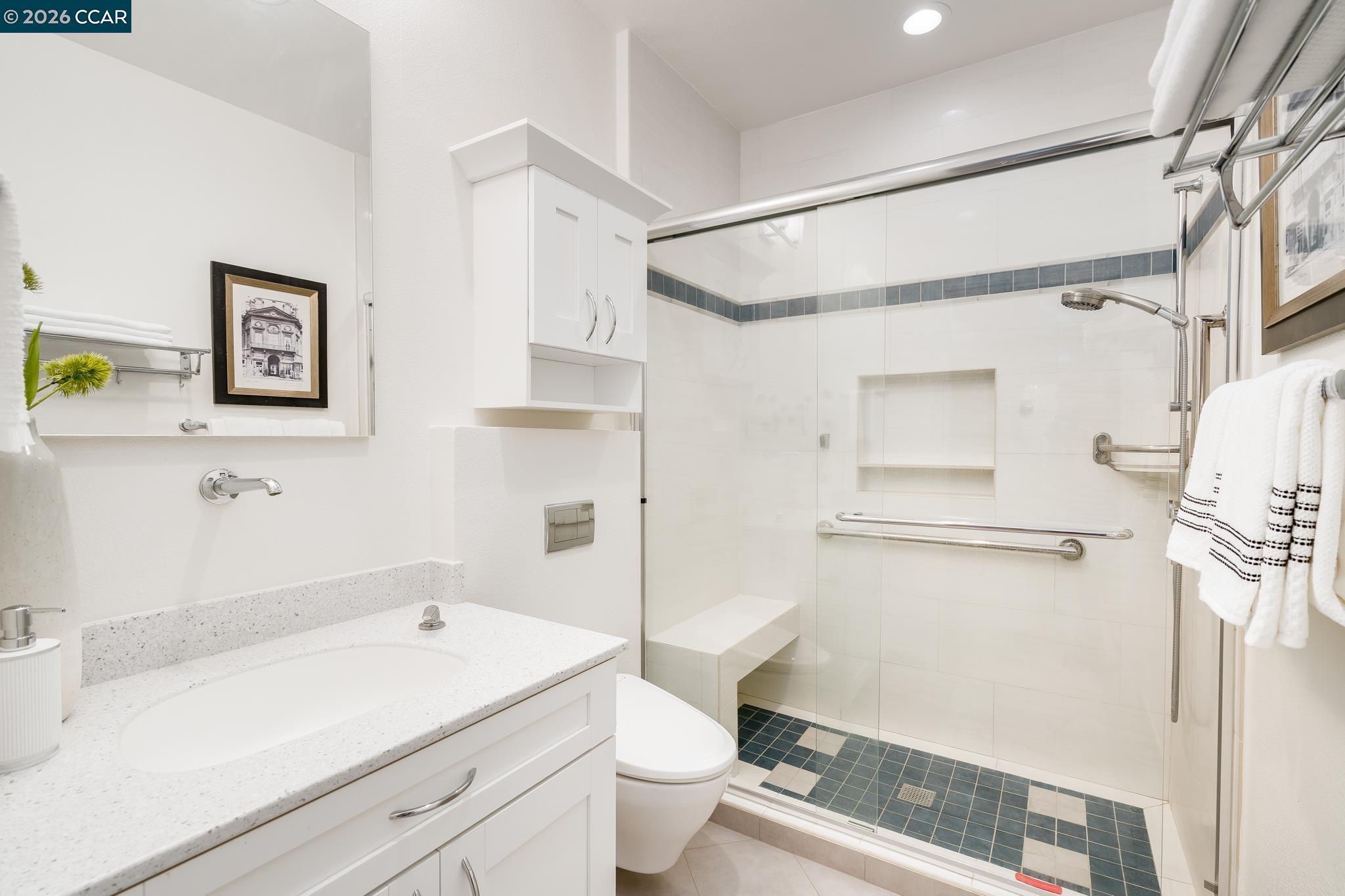 5058 Holborn Way San Ramon, CA 94582 - Photo 14 of 46 a bathroom with a sink a toilet and shower