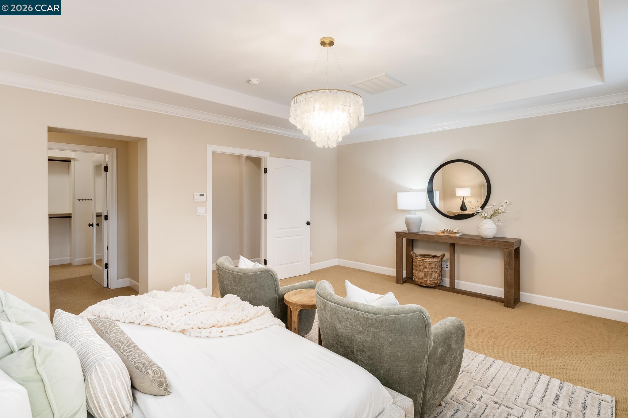 5058 Holborn Way San Ramon, CA 94582 - Photo 19 of 46 a bedroom with bed and a chandelier