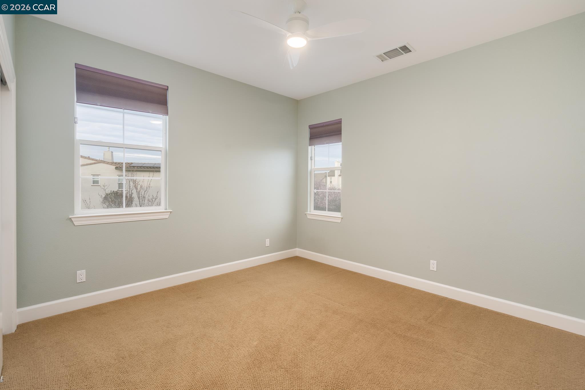 5058 Holborn Way San Ramon, CA 94582 - Photo 27 of 46 an empty room with windows