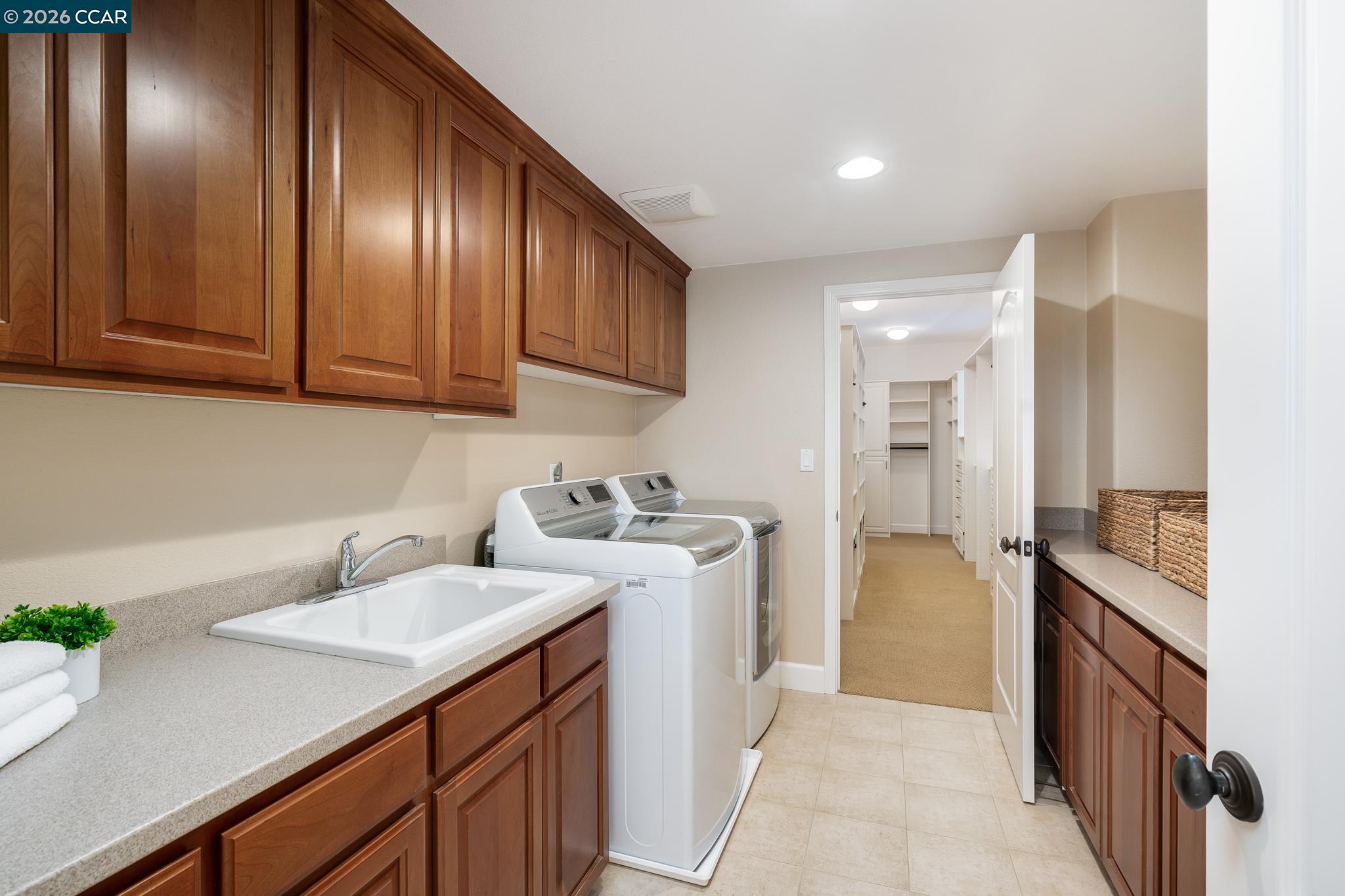 5058 Holborn Way San Ramon, CA 94582 - Photo 28 of 46 a kitchen with stainless steel appliances granite countertop a sink a stove and a refrigerator