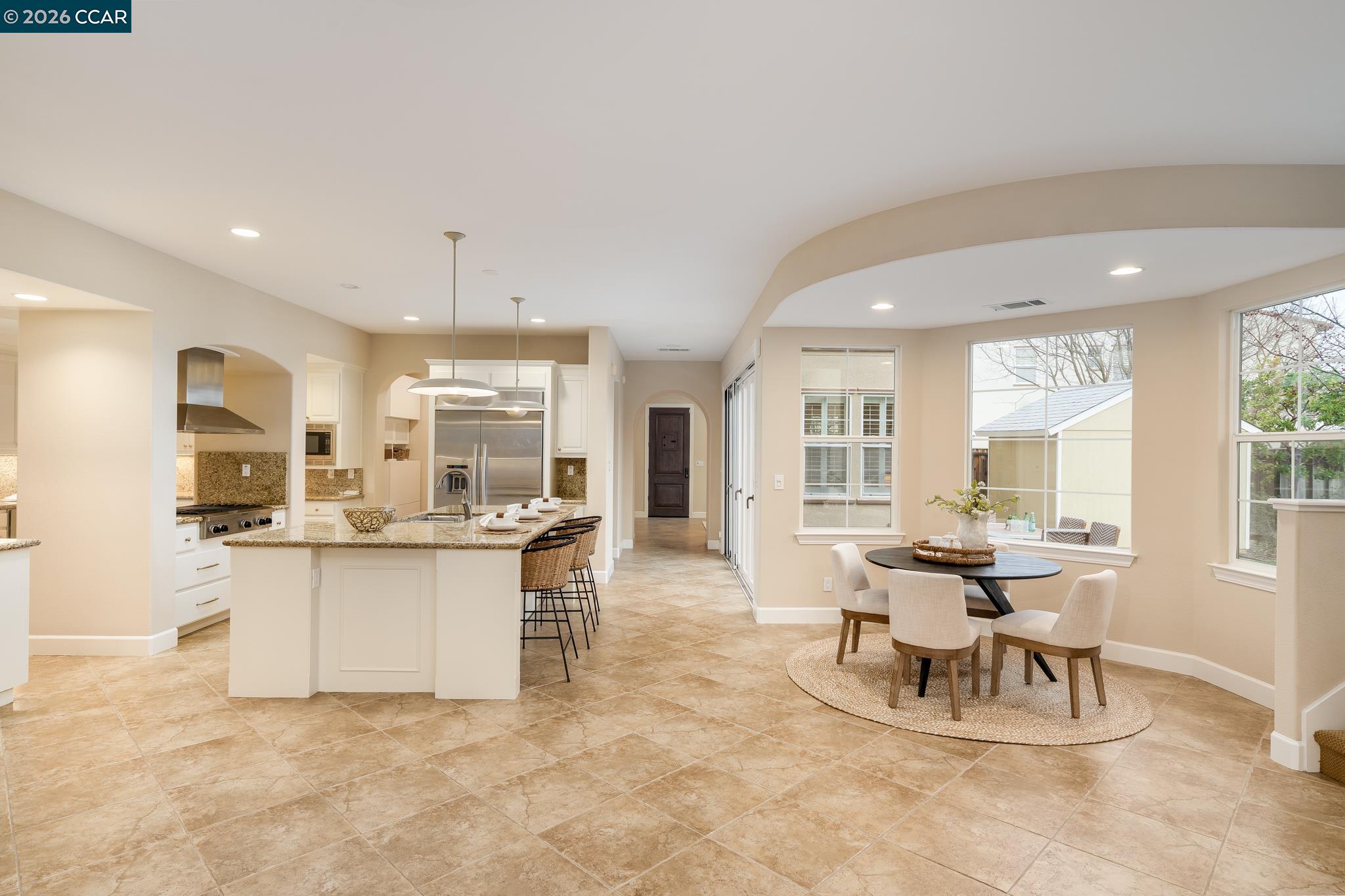 5058 Holborn Way San Ramon, CA 94582 - Photo 45 of 46 a view of a kitchen with dining table and chairs