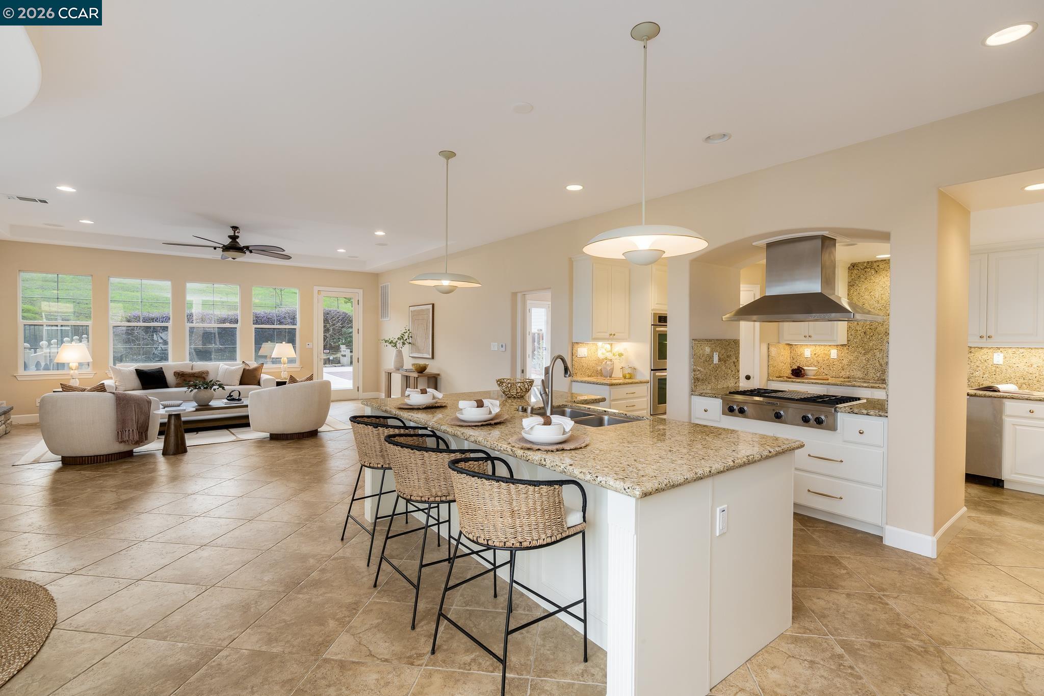 5058 Holborn Way San Ramon, CA 94582 - Photo 5 of 46 a kitchen with stainless steel appliances granite countertop a stove and a sink