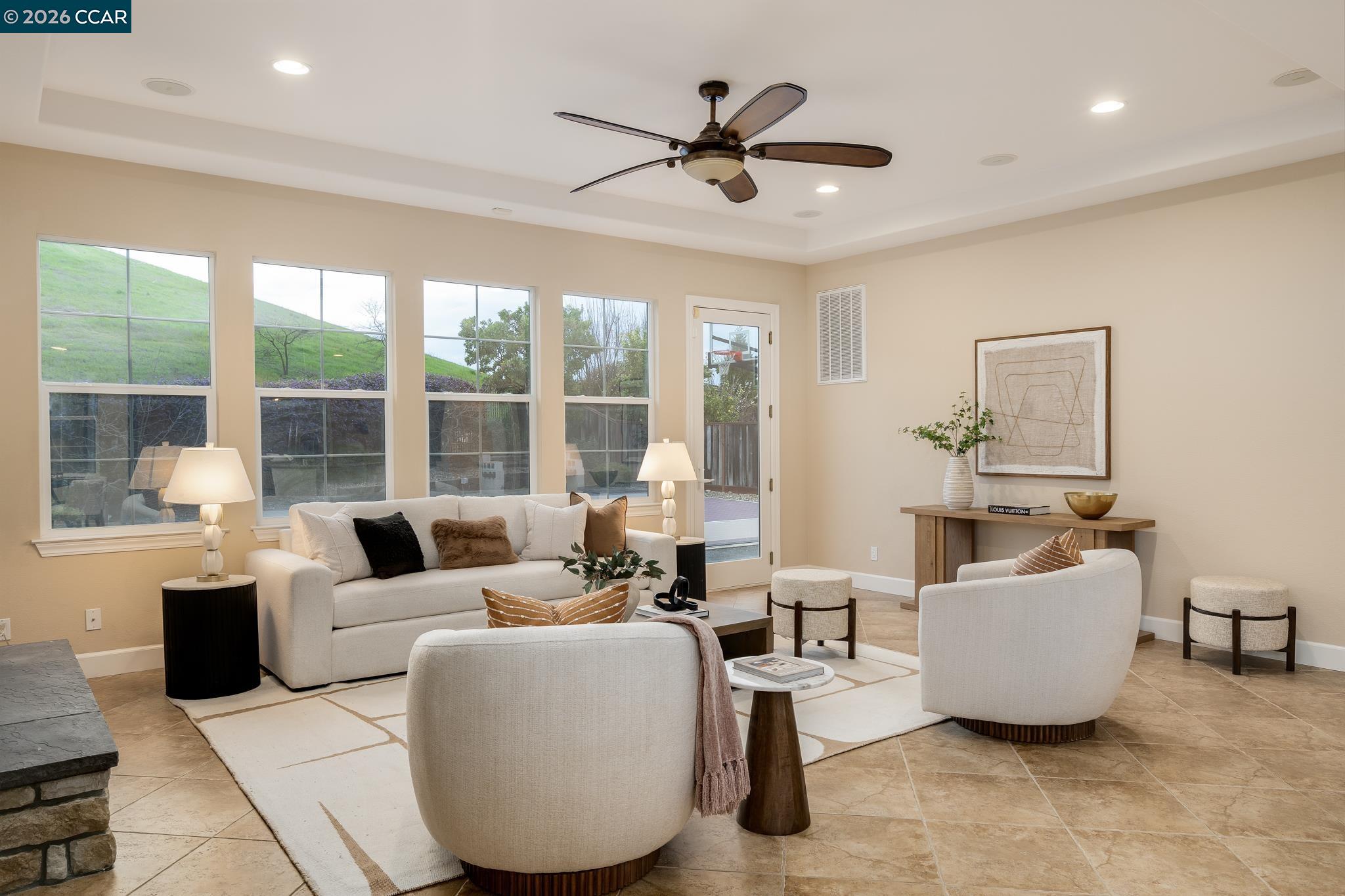 5058 Holborn Way San Ramon, CA 94582 - Photo 8 of 46 a living room with furniture and a large window with wooden floor