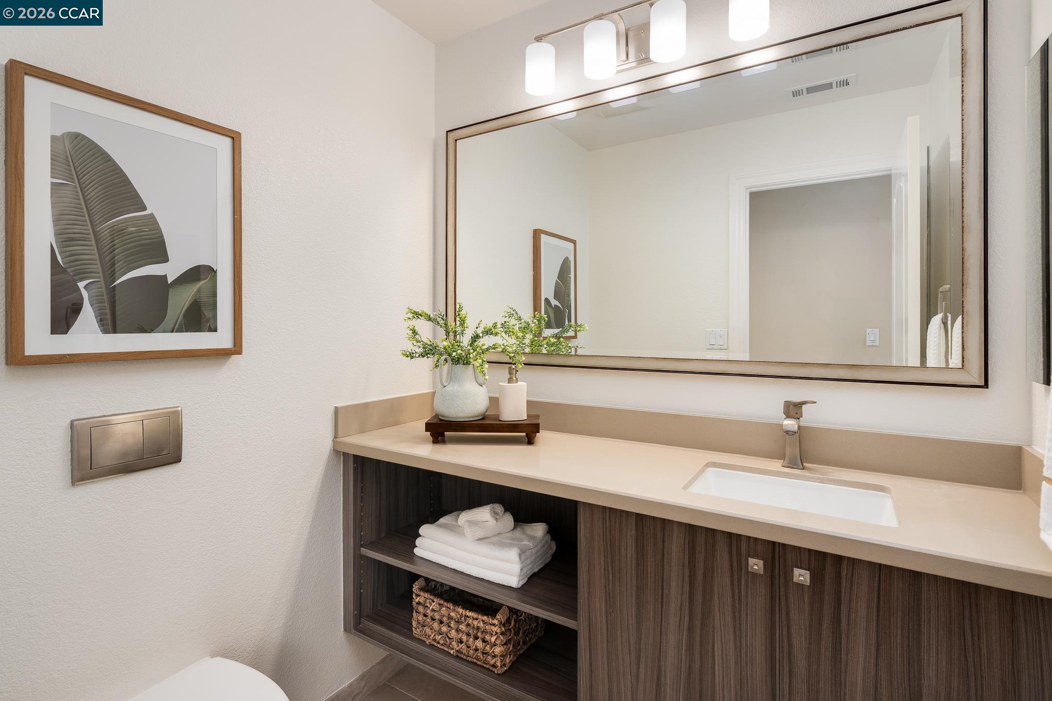 5058 Holborn Way San Ramon, CA 94582 - Photo 10 of 46 a bathroom with a sink and a mirror