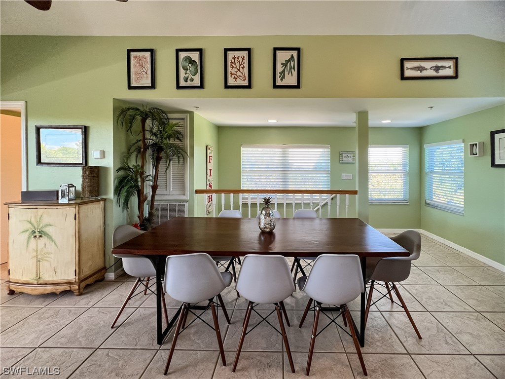 4510 Schooner Drive Upper Captiva, FL 33924 - Photo 21 of 48 a view of a dining room with furniture