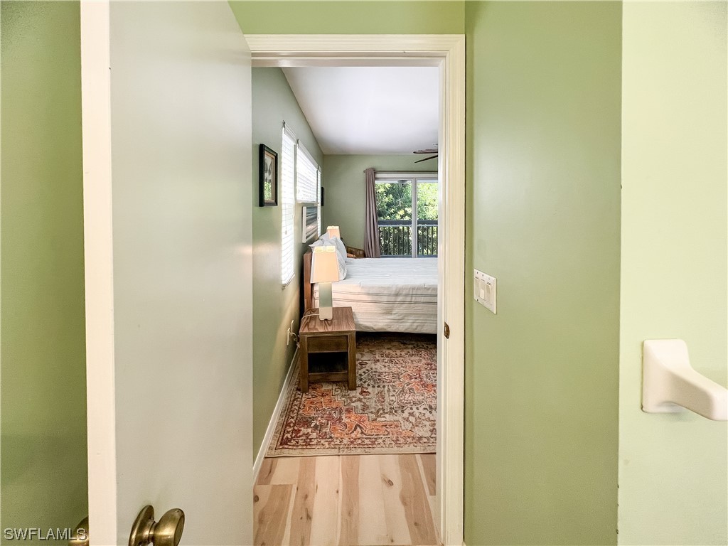 4510 Schooner Drive Upper Captiva, FL 33924 - Photo 41 of 48 a view of a hallway with a livingroom and a bathroom