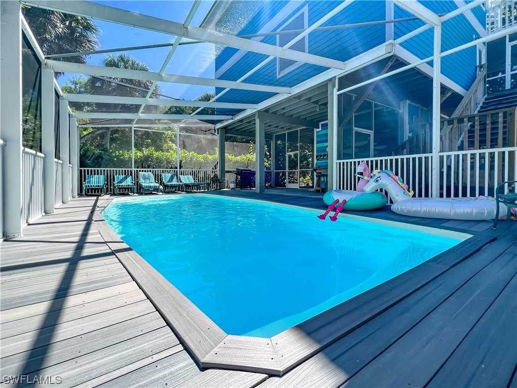 4510 Schooner Drive Upper Captiva, FL 33924 - Photo 47 of 48 a swimming pool with outdoor seating