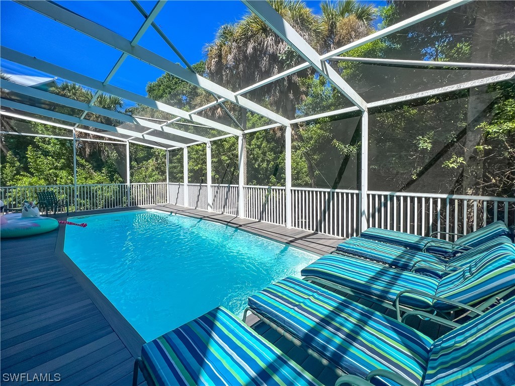 4510 Schooner Drive Upper Captiva, FL 33924 - Photo 10 of 48 a view of a backyard with sitting area