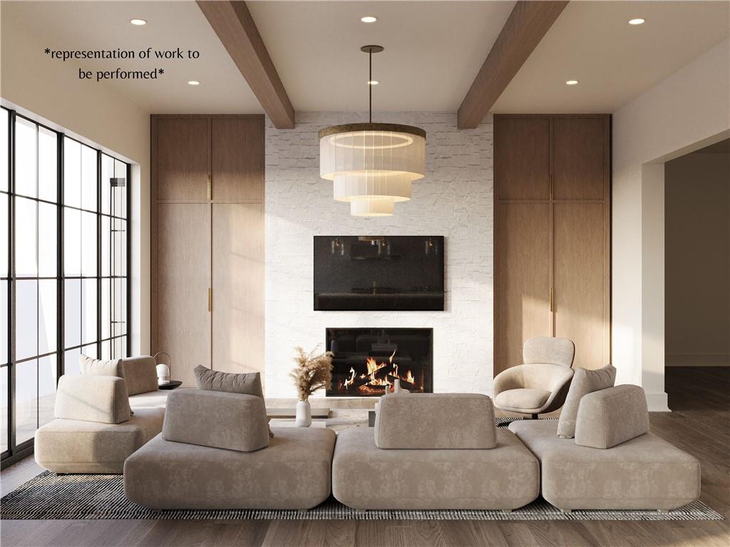 494 Johnson Brady Road Canton, GA 30115 - Photo 7 of 9 a living room with furniture a fireplace and a flat screen tv