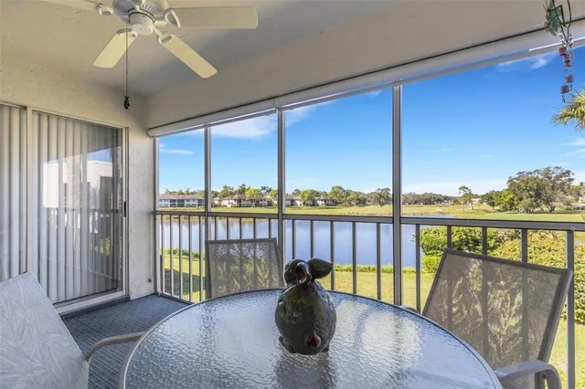 a view of a balcony with furniture