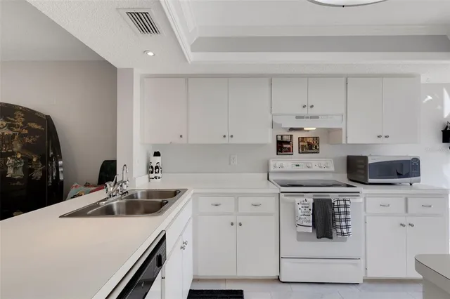 a view of a livingroom with furniture and a window