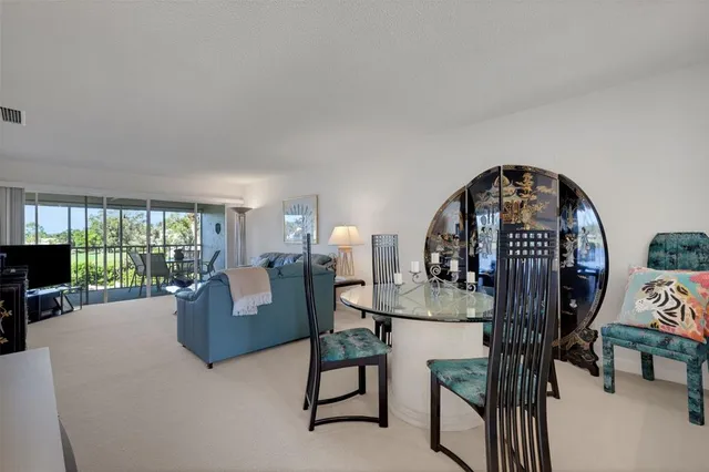 a bedroom with a bed and a ceiling fan