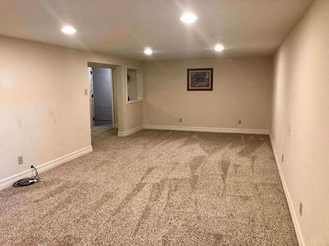 5206 North Woodburn Road Byron, IL 61010 - Photo 18 of 25 an empty room with a natural light