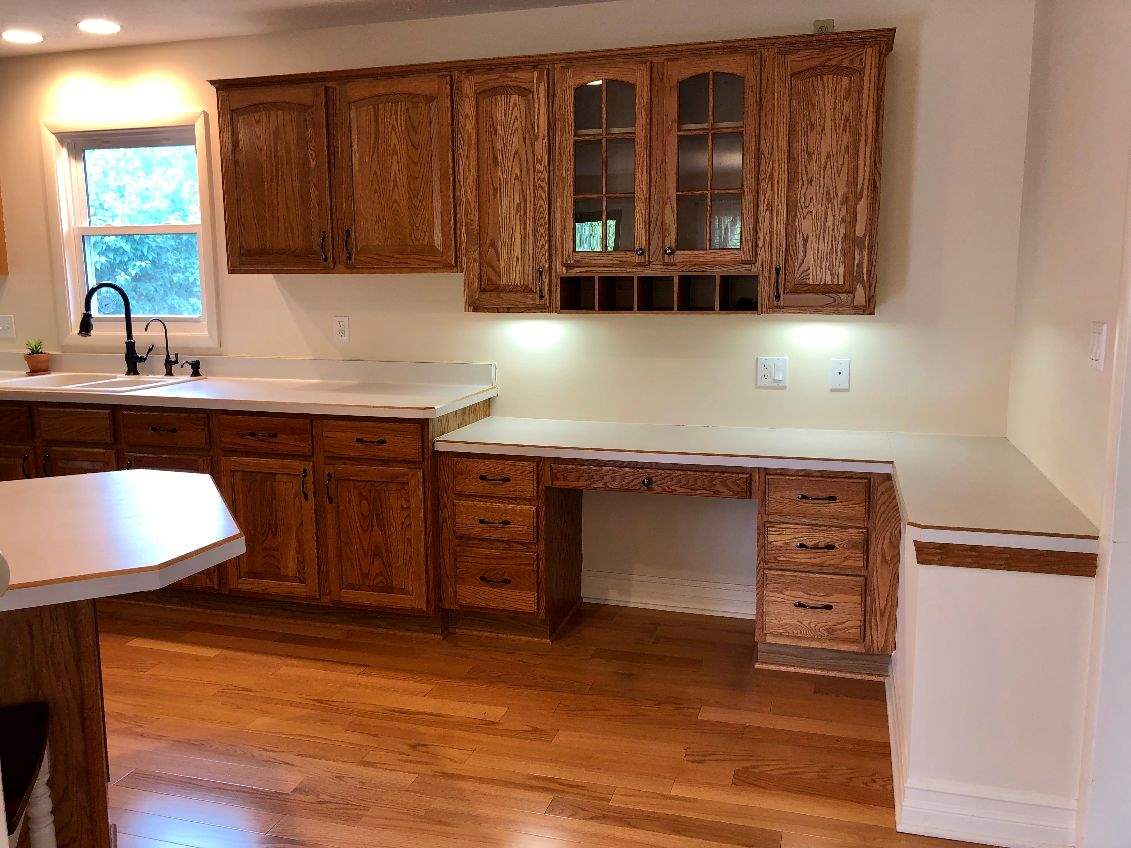5206 North Woodburn Road Byron, IL 61010 - Photo 5 of 25 a kitchen with stainless steel appliances granite countertop a stove a sink and a microwave