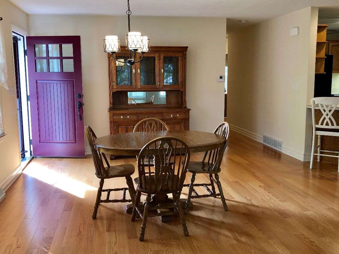 5206 North Woodburn Road Byron, IL 61010 - Photo 7 of 25 a dining room with furniture and wooden floor