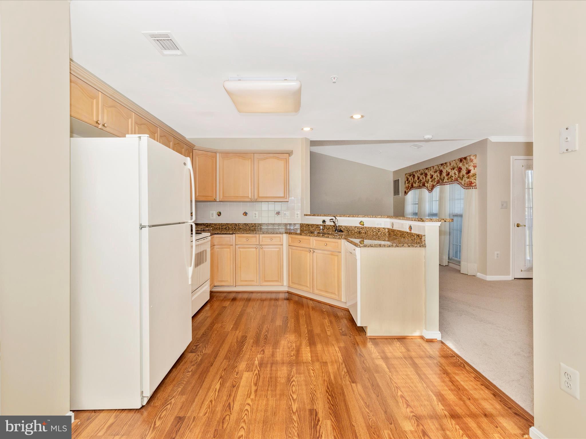 2509 Shelley Circle, Unit 5 3A Frederick, MD 21702 - Photo 18 of 47 a view of kitchen with wooden floor