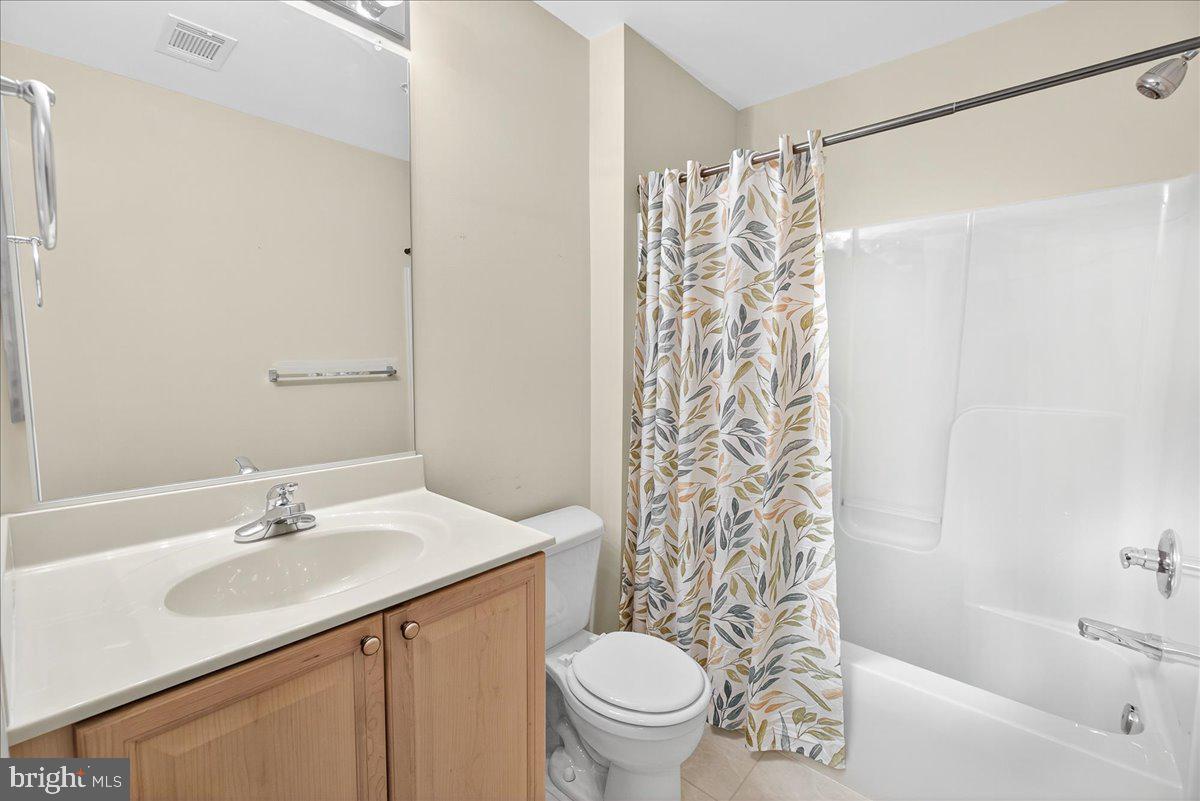 2509 Shelley Circle, Unit 5 3A Frederick, MD 21702 - Photo 30 of 47 a bathroom with a sink toilet and shower