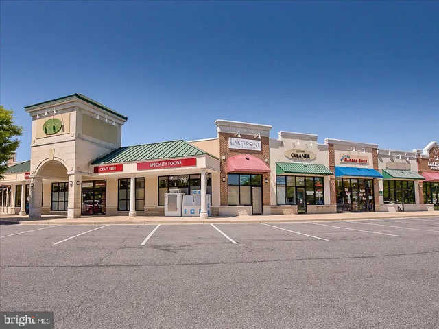 a front view of a building with street view