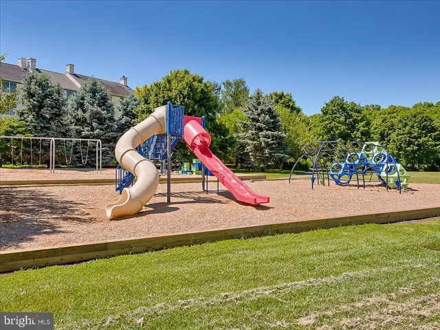 a view of a park with swings